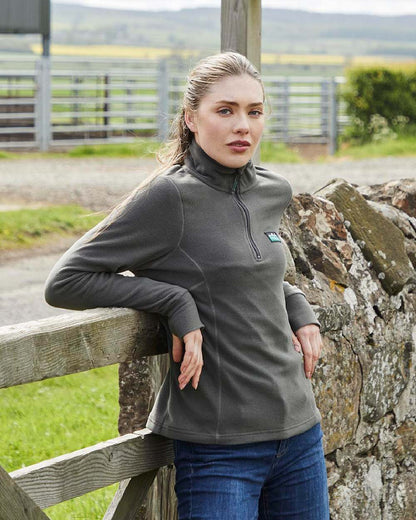 Moss coloured Ridgeline Ladies Narvik Fleece on farm background #colour_moss