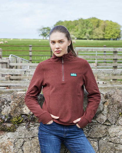 Oxblood coloured Ridgeline Ladies Narvik Fleece on farm background #colour_oxblood