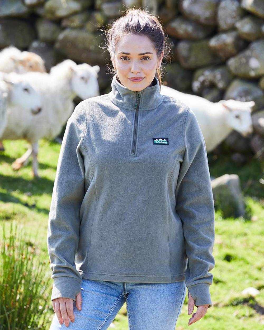 Smokey Olive coloured Ridgeline Ladies Narvik Fleece on mountain background #colour_smokey-olive