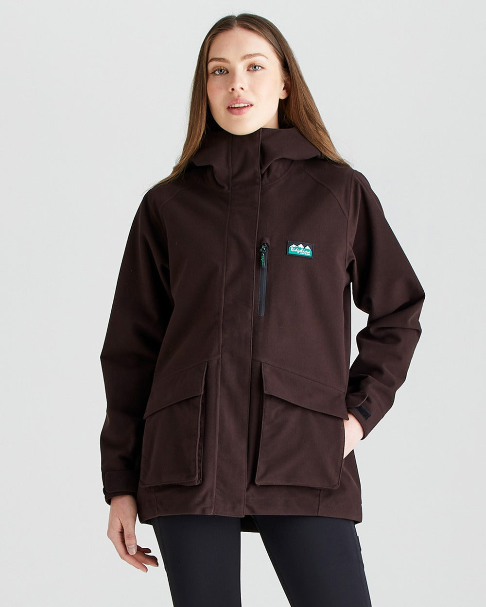 Deep Bark coloured Ridgeline Ladies Rhea Jacket on grey background #colour_deep-bark