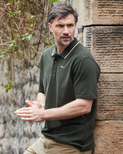 Deep Forest Coloured Ridgeline Mens Kilworth Polo Shirt on outdoor background #colour_deep-forest