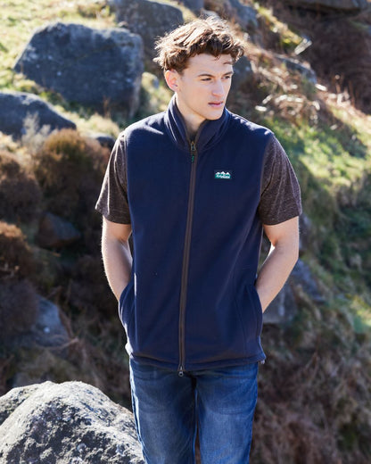 Navy Coloured Ridgeline Mens Kodiak Gilet on hilly background #colour_navy