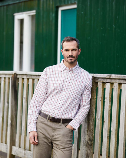 Russet coloured Ridgeline Mens Sedgebrook Shirt on house background #colour_russet