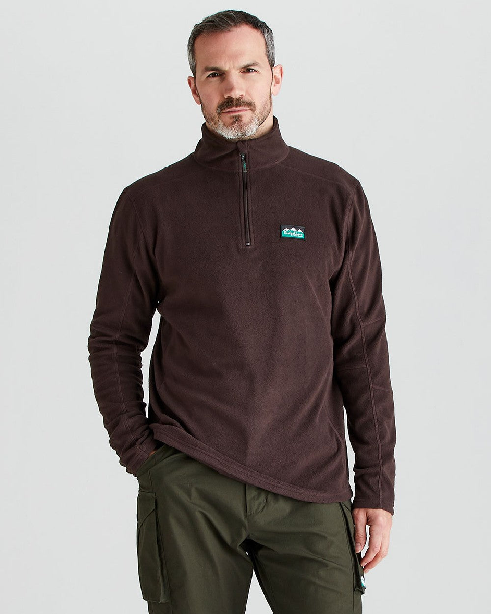 Deep Bark coloured Ridgeline Narvik Fleece on grey background #colour_deep-bark