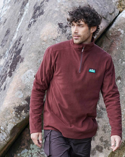 Oxblood coloured Ridgeline Narvik Fleece on yard background #colour_oxblood