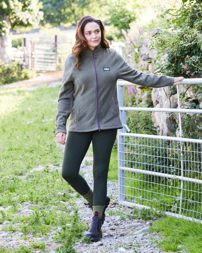 Deep Forest coloured Ridgeline Womens Infinity Leggings on backyard background #colour_deep-forest