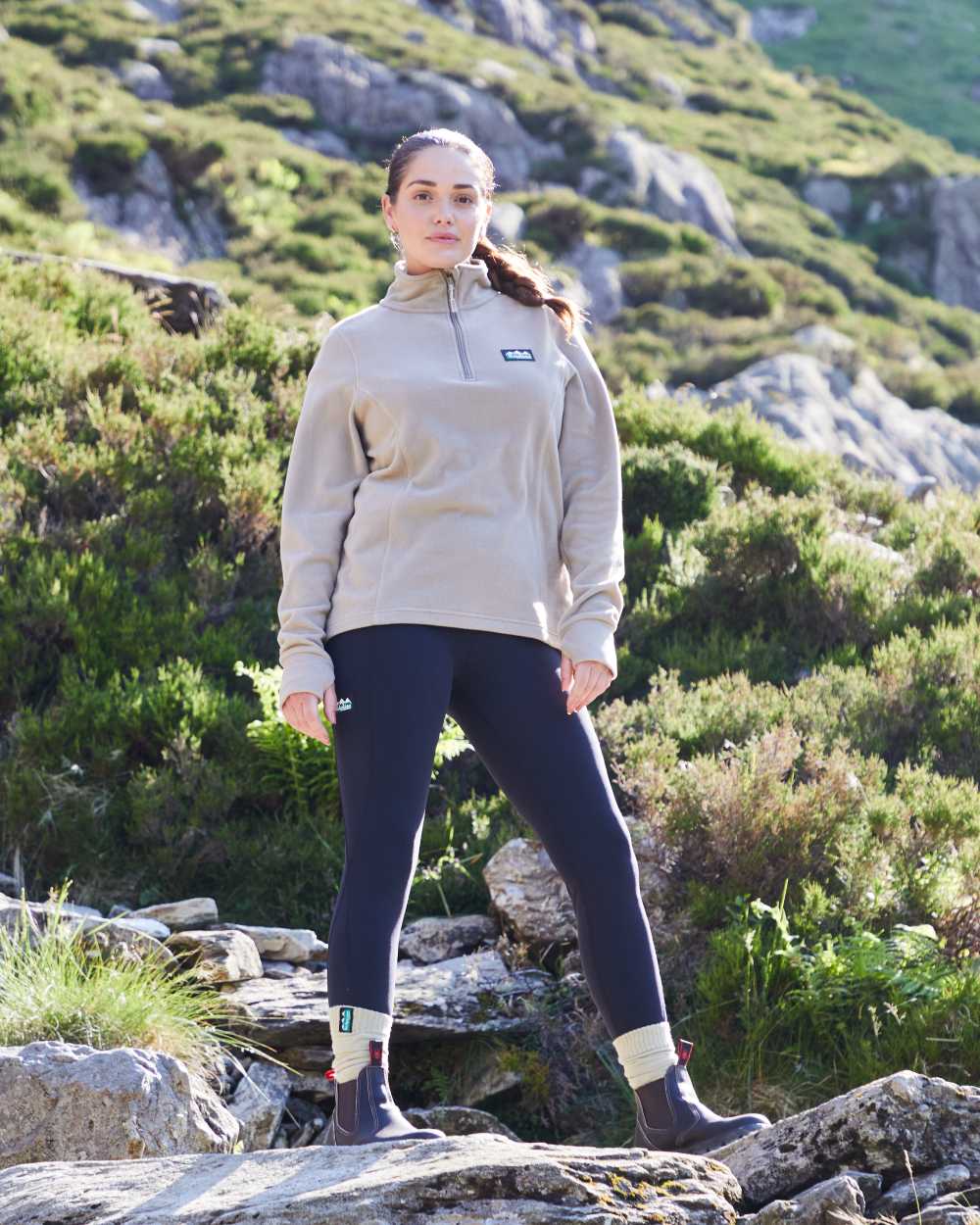 Navy coloured Ridgeline Womens Infinity Leggings on mountain background #colour_navy