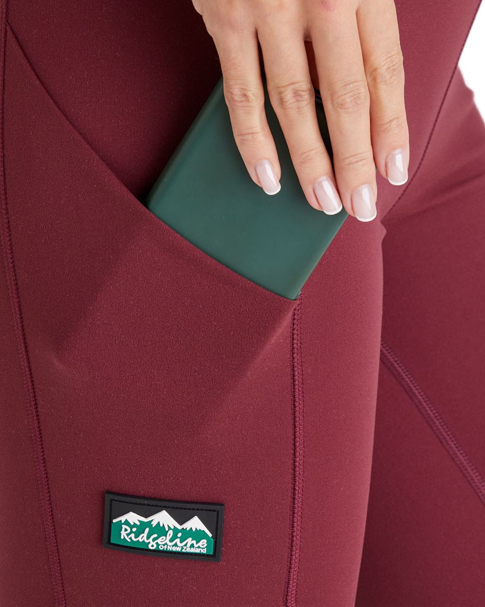 Winter Berry Coloured Ridgeline Womens Infinity Leggings On A White Background #colour_winter-berry