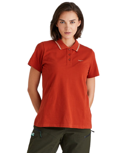 Russet coloured Ridgeline Womens Kilworth Polo Shirt on white background #colour_russet