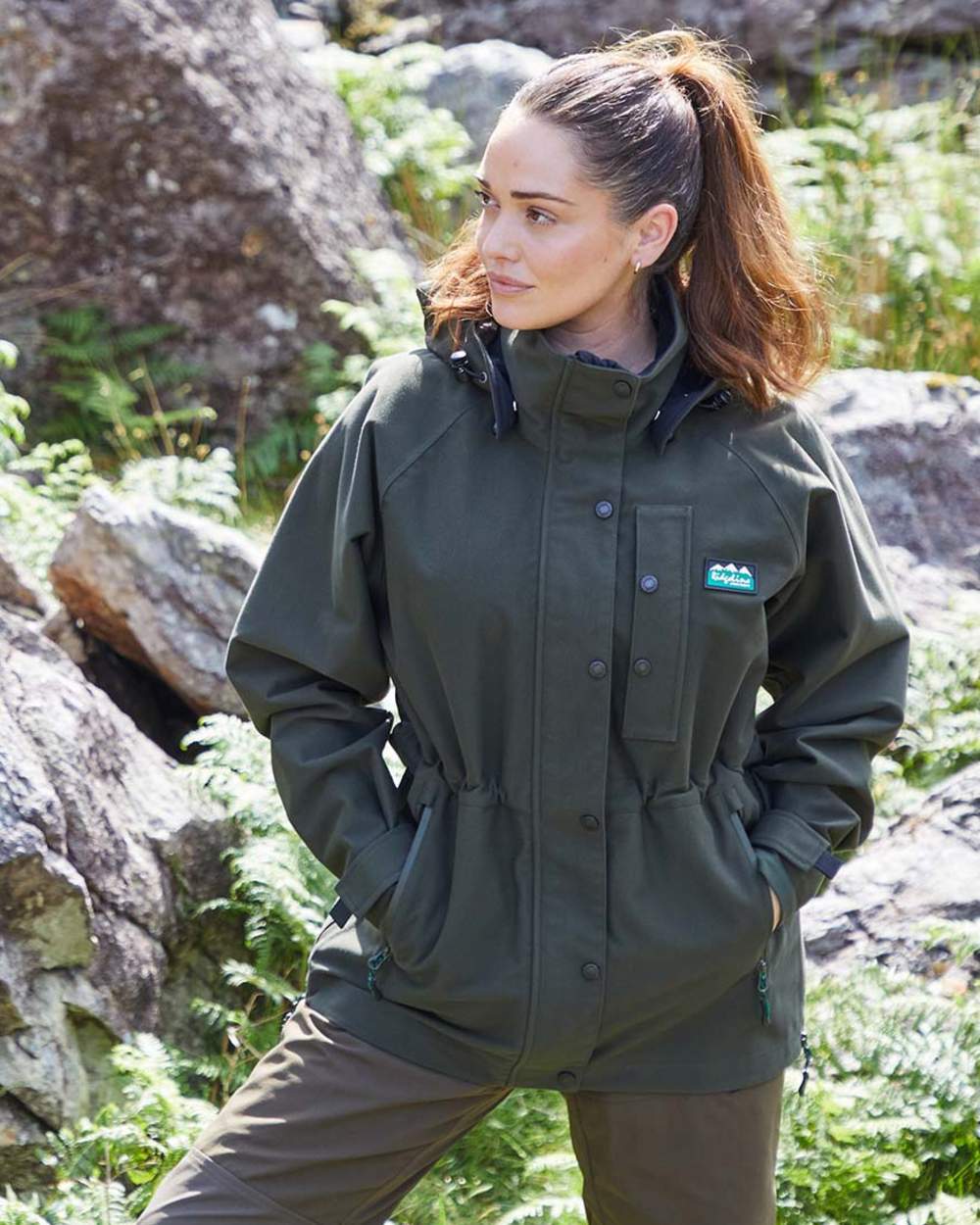 Deep Forest coloured Ridgeline Womens Monsoon Classic Jacket on lake background #colour_deep-forest