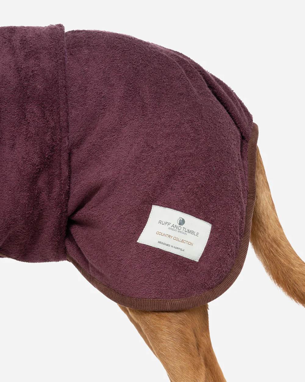 Burgundy coloured Ruff & Tumble Country Dog Drying Coat on ginger dog on white background #colour_burgundy