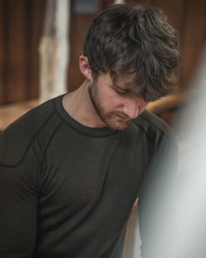 Pine Green coloured Seeland Apex One Hundred Long Sleeve T-Shirt on outdoor background #colour_pine-green