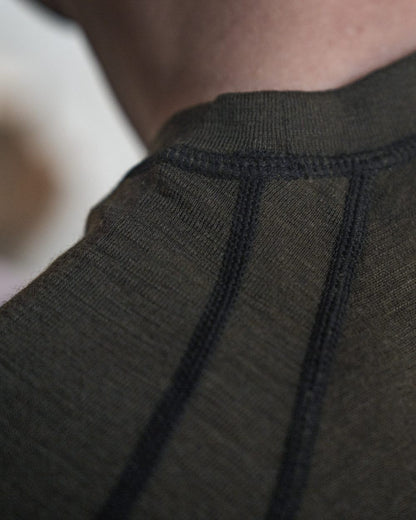 Pine Green coloured Seeland Apex One Hundred Long Sleeve T-Shirt on outdoor background #colour_pine-green