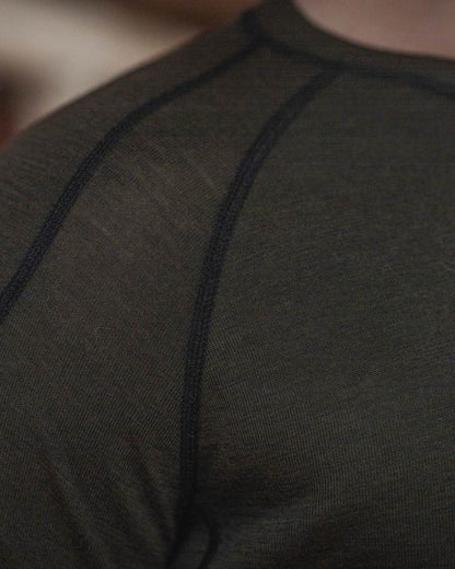 Pine Green coloured Seeland Apex One Hundred Long Sleeve T-Shirt on outdoor background #colour_pine-green