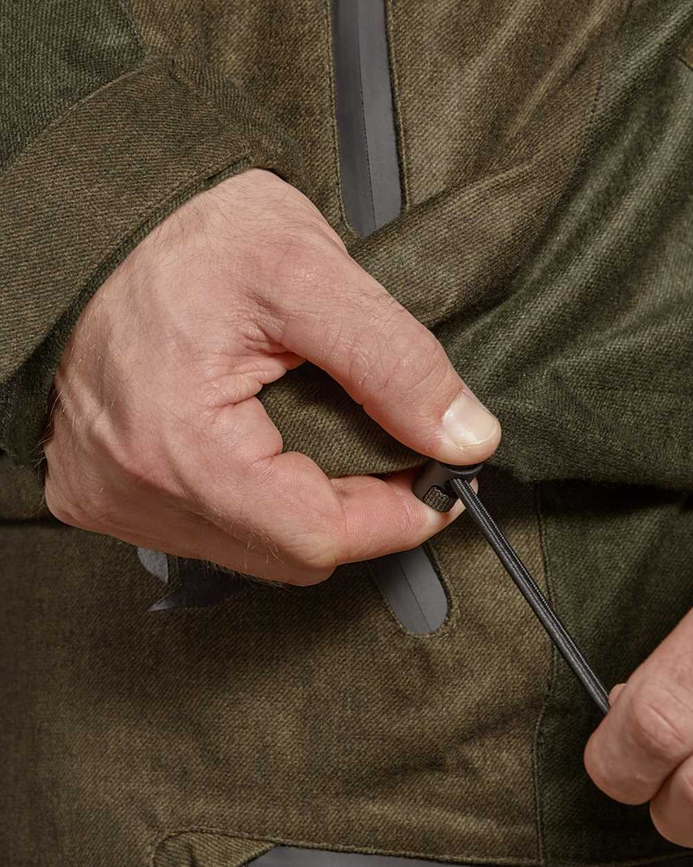 Pine Green Melange coloured Seeland Avail Jacket on white background #colour_pine-green-melange