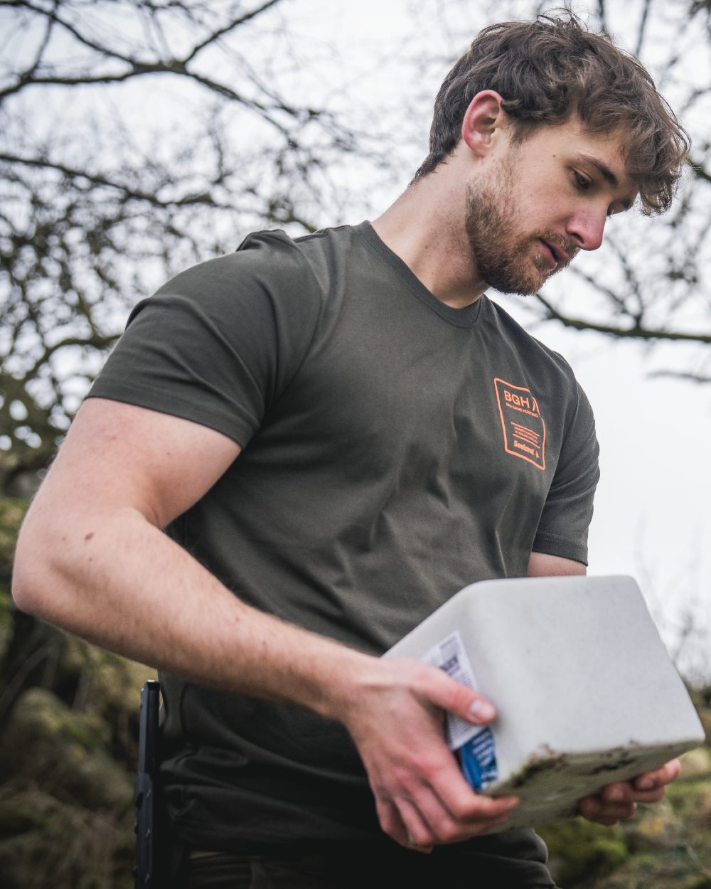 Pine Green coloured Seeland BGH T-Shirt on forest background #colour_pine-green