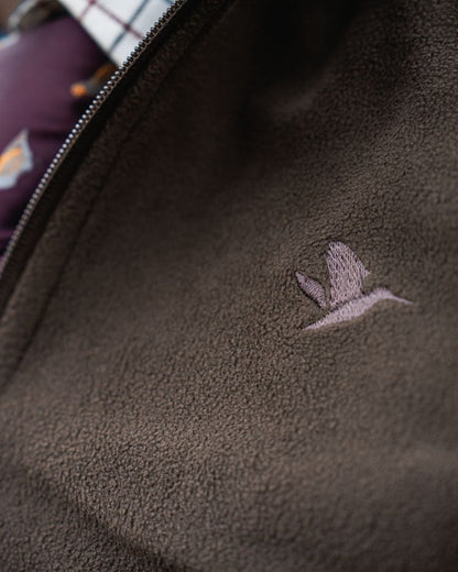 Pine Green Coloured Seeland Benjamin Half Zip Fleece on outdoor background #colour_pine-green