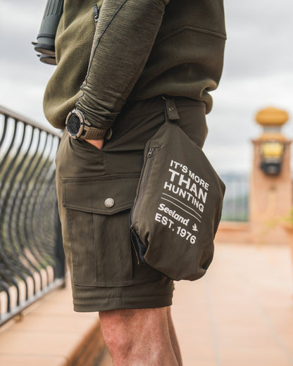 Grizzly Brown coloured Seeland Birch Zip-Off Trousers on sky background #colour_grizzly-brown