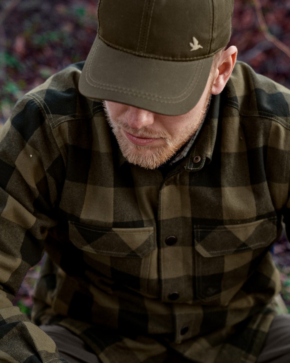 Green Check Coloured Seeland Canada Quilted Shirt on forest background #colour_green-check
