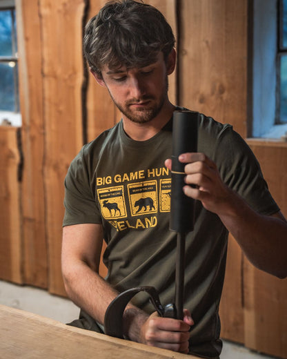 Grape Leaf Coloured Seeland Caution T-Shirt on indoor background #colour_grape-leaf
