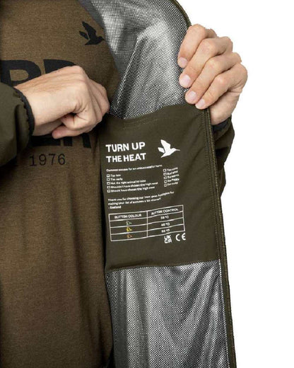 Pine Green Coloured Seeland Celsius Heat Jacket on white background #colour_pine-green