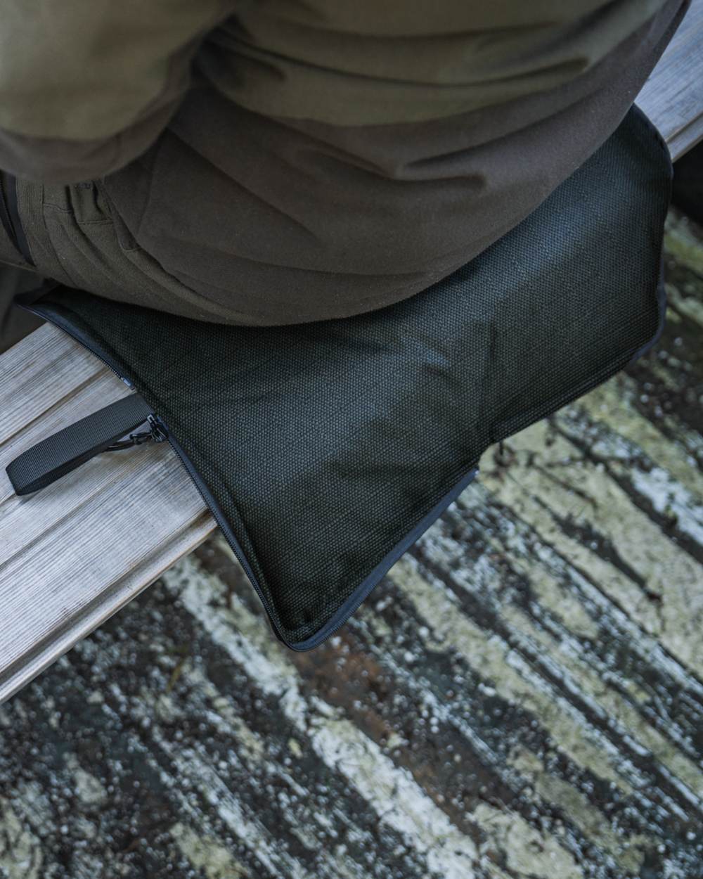 Pine Green coloured Seeland Celsius Heat Seat Pad on forest background #colour_pine-green