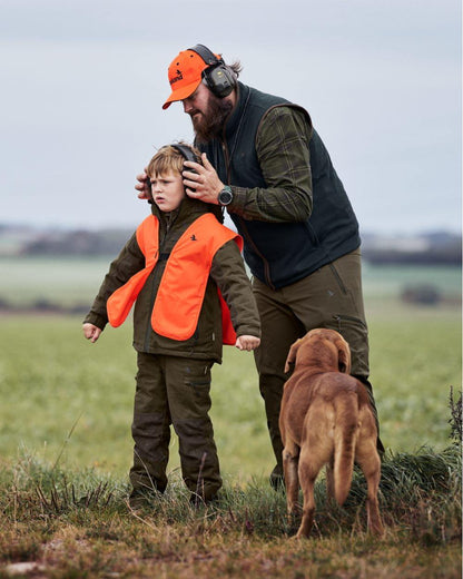 Pine Green Melange Coloured Seeland Childrens Avail Jacket on outdoor background #colour_pine-green-melange