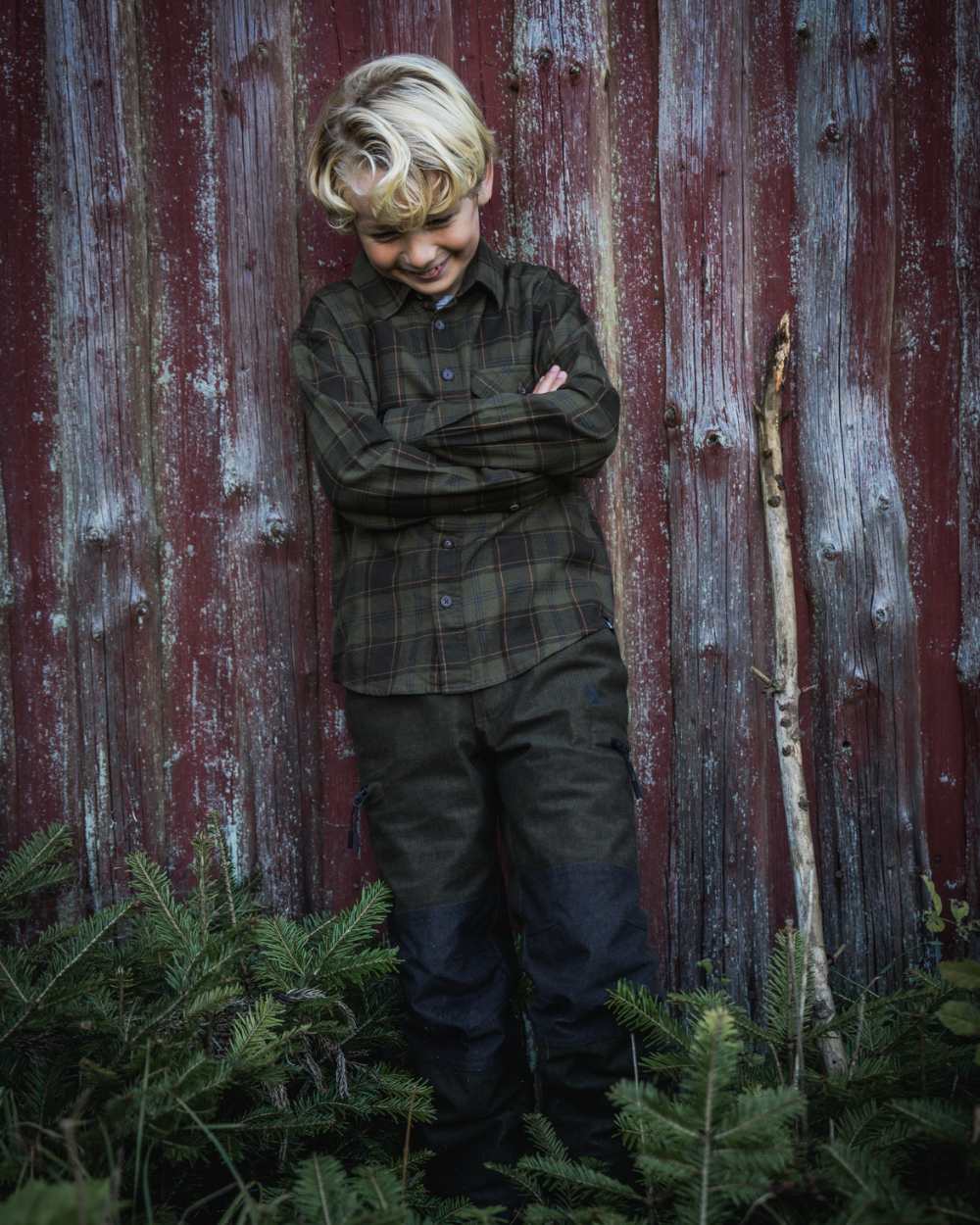 Pine Green Dark Navy Check Coloured Seeland Childrens Glen Flannel Shirt on outdoor background #colour_pine-green-dark-navy-check