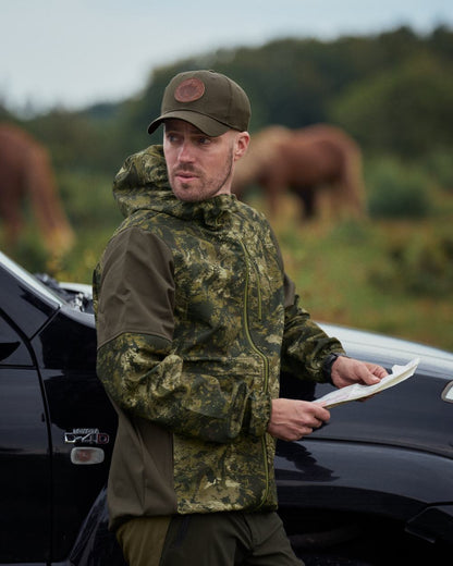 InVis Green Coloured Seeland Cross Windbeater Jacket on outdoor  background #colour_invis-green