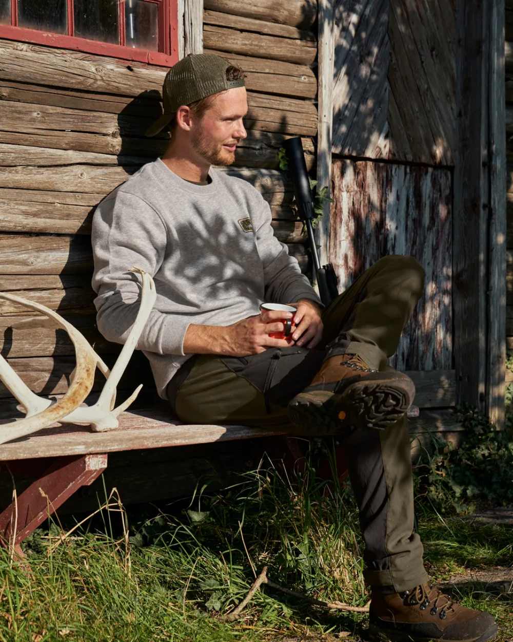 Dark Grey Melange Coloured Seeland Cryo Sweatshirt on outdoor background #colour_dark-grey-melange