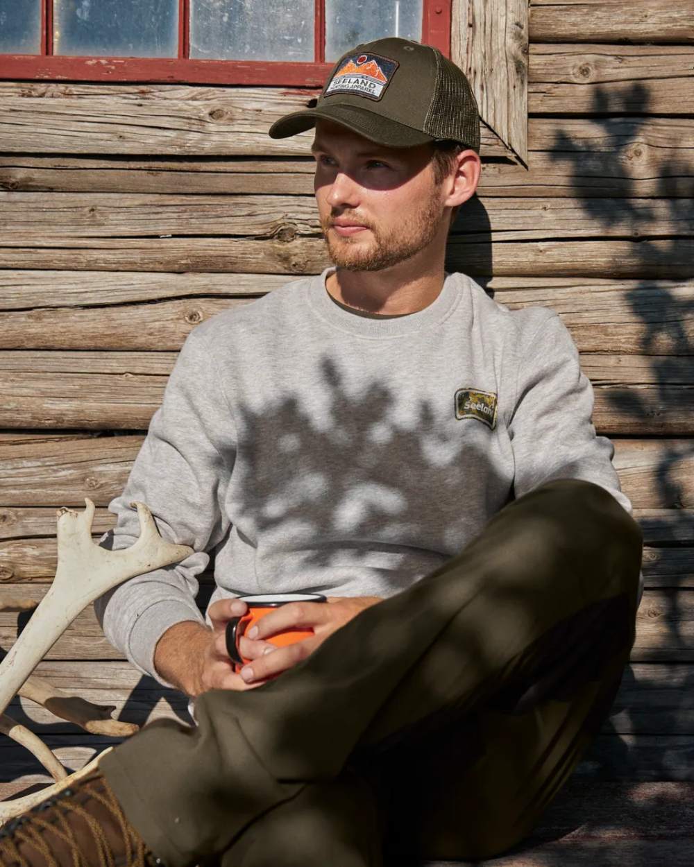 Dark Grey Melange Coloured Seeland Cryo Sweatshirt on outdoor background #colour_dark-grey-melange