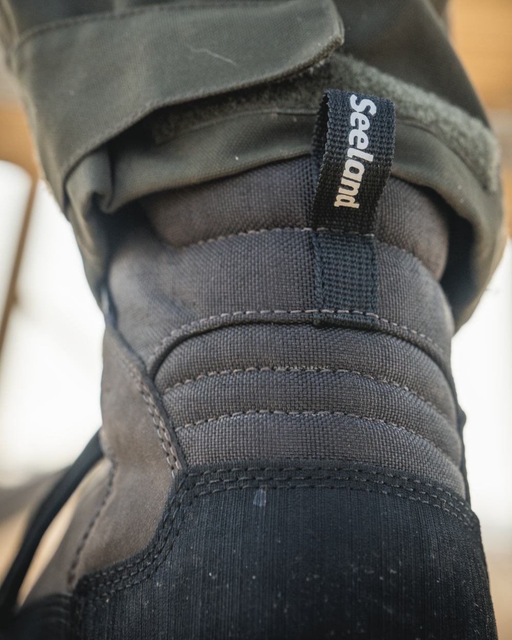 Dark Brown coloured Seeland Enduro Explore Mid Boots on outdoor background #colour_dark-brown