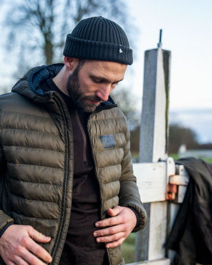 Light Pine coloured Seeland Fahrenheit Jacket on forest background #colour_light-pine