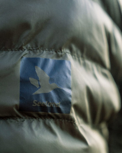 Military Olive coloured Seeland Fahrenheit Jacket on white background #colour_military-olive