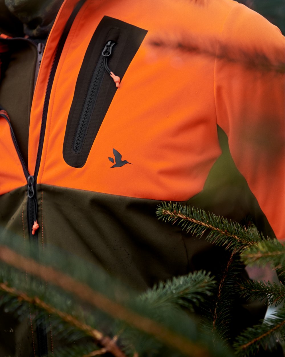 Hi-Vis Orange Coloured Seeland Force Advanced Softshell Jacket on outdoor background #colour_hi-vis-orange