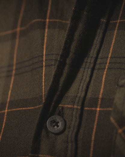 Pine Green Dark Navy Check Coloured Seeland Glen Flannel Shirt On A Outdoor Background #colour_pine-green-dark-navy-check