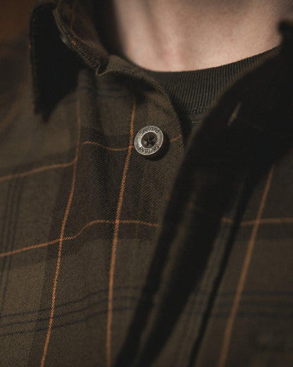 Pine Green Dark Navy Check Coloured Seeland Glen Flannel Shirt On A Outdoor Background #colour_pine-green-dark-navy-check