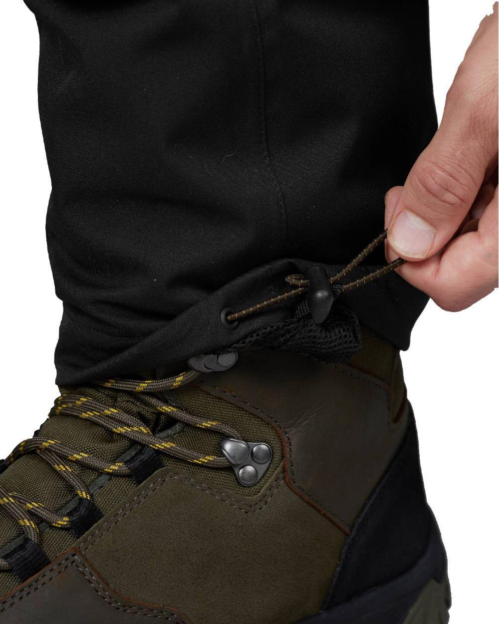 Black Coloured Seeland Hawker Light Explore Trousers on white background #colour_black