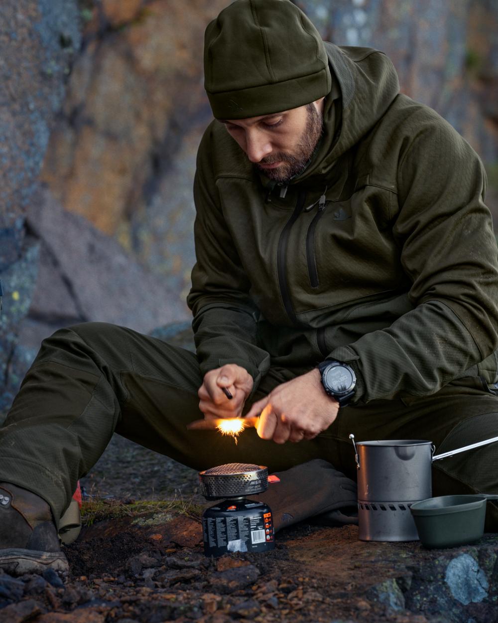 Pine Green Coloured Seeland Hawker Shell II Jacket on outdoor background #colour_pine-green