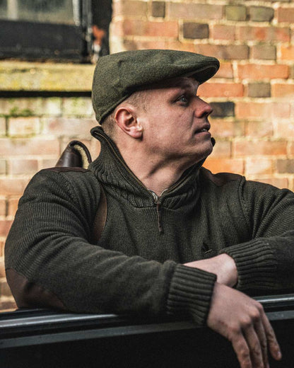 Dark Brown Coloured Seeland Haze Windbreaker Knit On A Wall Background #colour_dark-brown