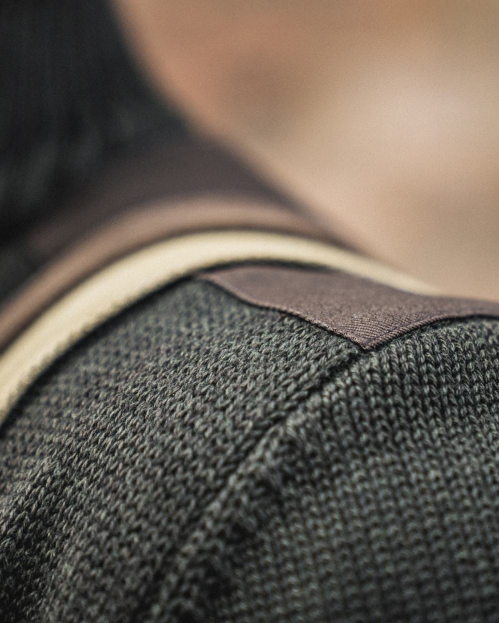 Dark Brown Coloured Seeland Haze Windbreaker Knit On A blurry Background #colour_dark-brown