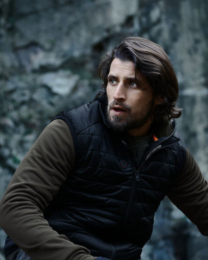 Black Coloured Seeland Heat Quilted Waistcoat on outdoor background #colour_black