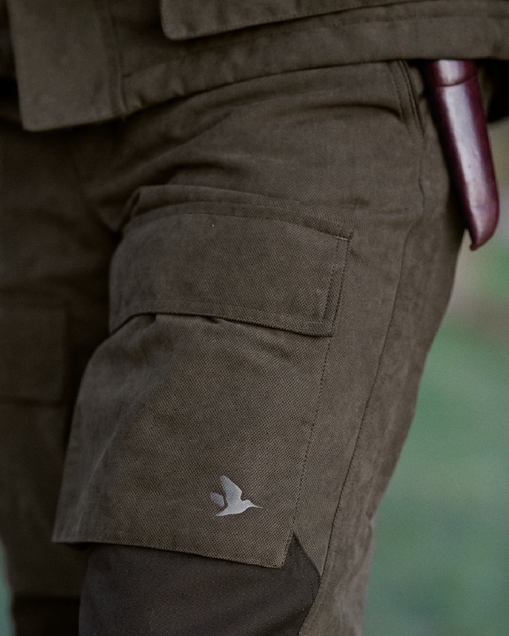 Grizzly Brown Coloured Seeland Helt II Waterproof Trousers on outdoor background #colour_grizzly-brown