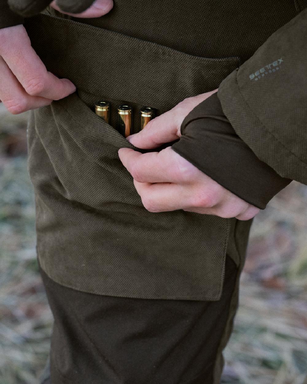 Grizzly Brown Coloured Seeland Helt II Waterproof Trousers on outdoor background #colour_grizzly-brown