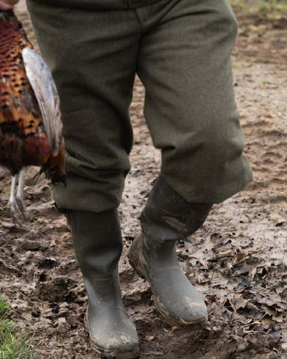 Pine Green Coloured Seeland Hillside Enforced Wellingtons on outdoor background #colour_pine-green