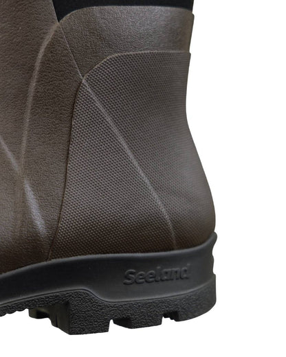 Dark Brown Coloured Seeland Hillside Flex Wellingtons on white background #colour_dark-brown