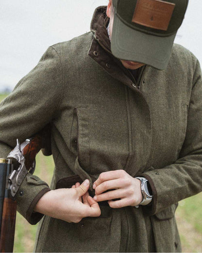 Moss Green Coloured Seeland Hillside Harriet Jacket on outdoor background #colour_moss-green