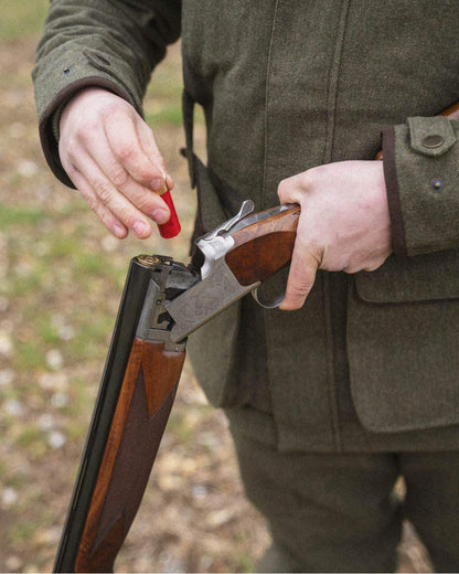 Moss Green Coloured Seeland Hillside Jacket on outdoor background #colour_moss-green