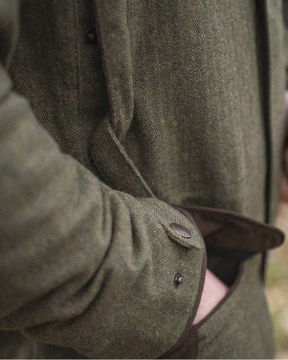 Moss Green Coloured Seeland Hillside Jacket on outdoor background #colour_moss-green