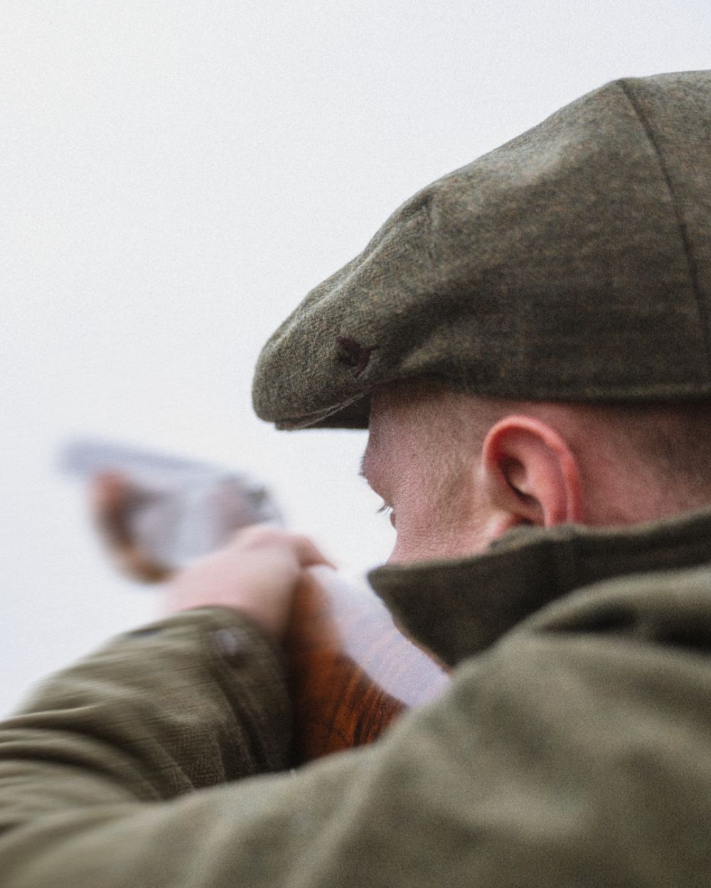 Moss Green Coloured Seeland Hillside Sixpence Cap on outdoor background #colour_moss-green